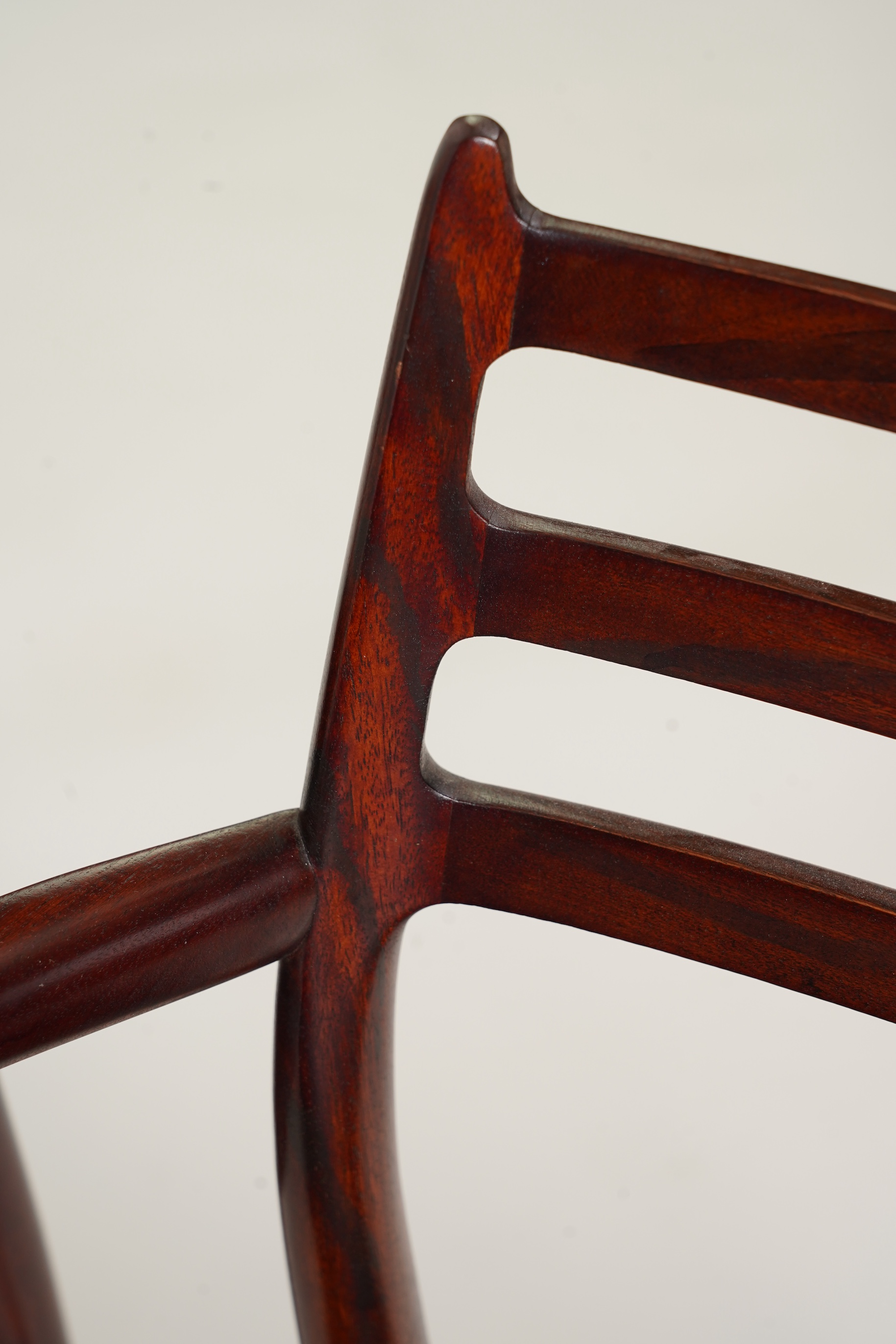 Niels Otto Møller (Danish, 1920-1982) for JL Møllers Møbelfabrik: A pair of 'Model 62' carver chairs